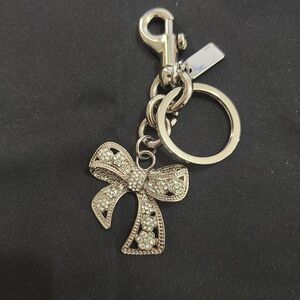 Coach Elegant Silver Bow Keychain